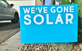 solar sign in yard
